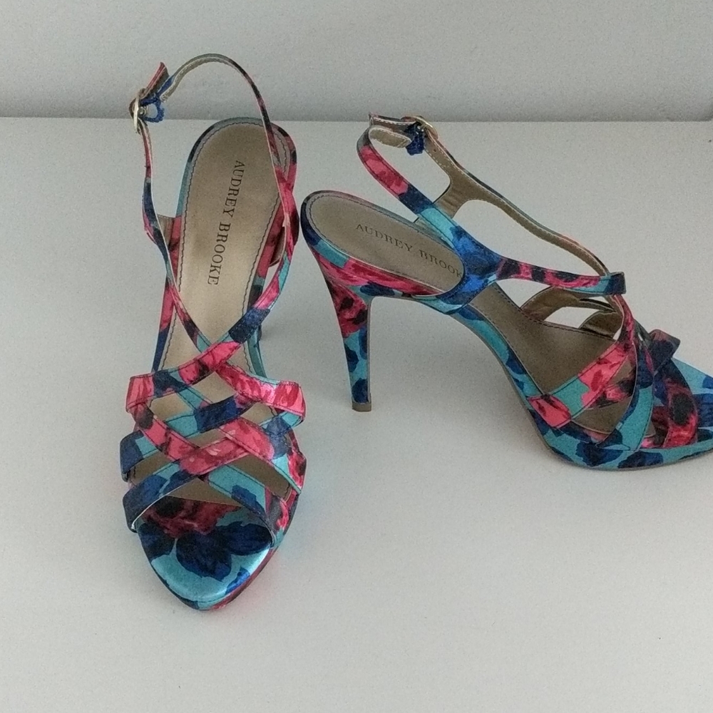 Red and blue sandals. Pattern is roses.
